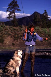Fly fisherman and dog