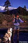 Fly fisherman and dog