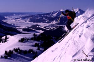 Skier on Headwall with East River Valley in background
