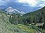 Mid-afternoon view of Mt. Crested Butte from Kebler Pass Road. Everything is looking greener than ever.