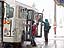 Skiers rush to the bus, as another powder morning awakens the Butte.