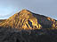 The last light of sunset illuminates Mt. Crested Butte