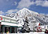 A winter scene of the Post Office and CB Mountain.