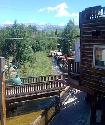 Another warm, sunny day in Crested Butte.  I was a little slow out the door with the camera to catch the shot, but if you look close, there are even people tubing down Coal Creek behind our office today!!