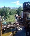 Another warm, sunny day in Crested Butte.  I was a little slow out the door with the camera to catch the shot, but if you look close, there are even people tubing down Coal Creek behind our office today!!