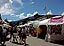 Happy shoppers enjoy the sunshine while browsing through our annual Festival of the Arts.