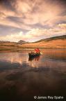 Man and Dog in Canoe