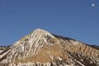 Mount Crested Butte with a nearly full moon.